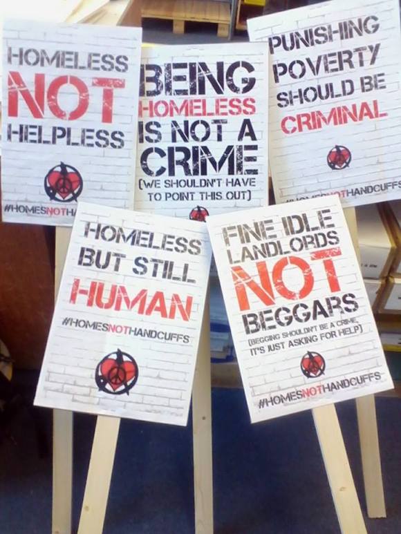 HomesNotHandcuffsPlacards